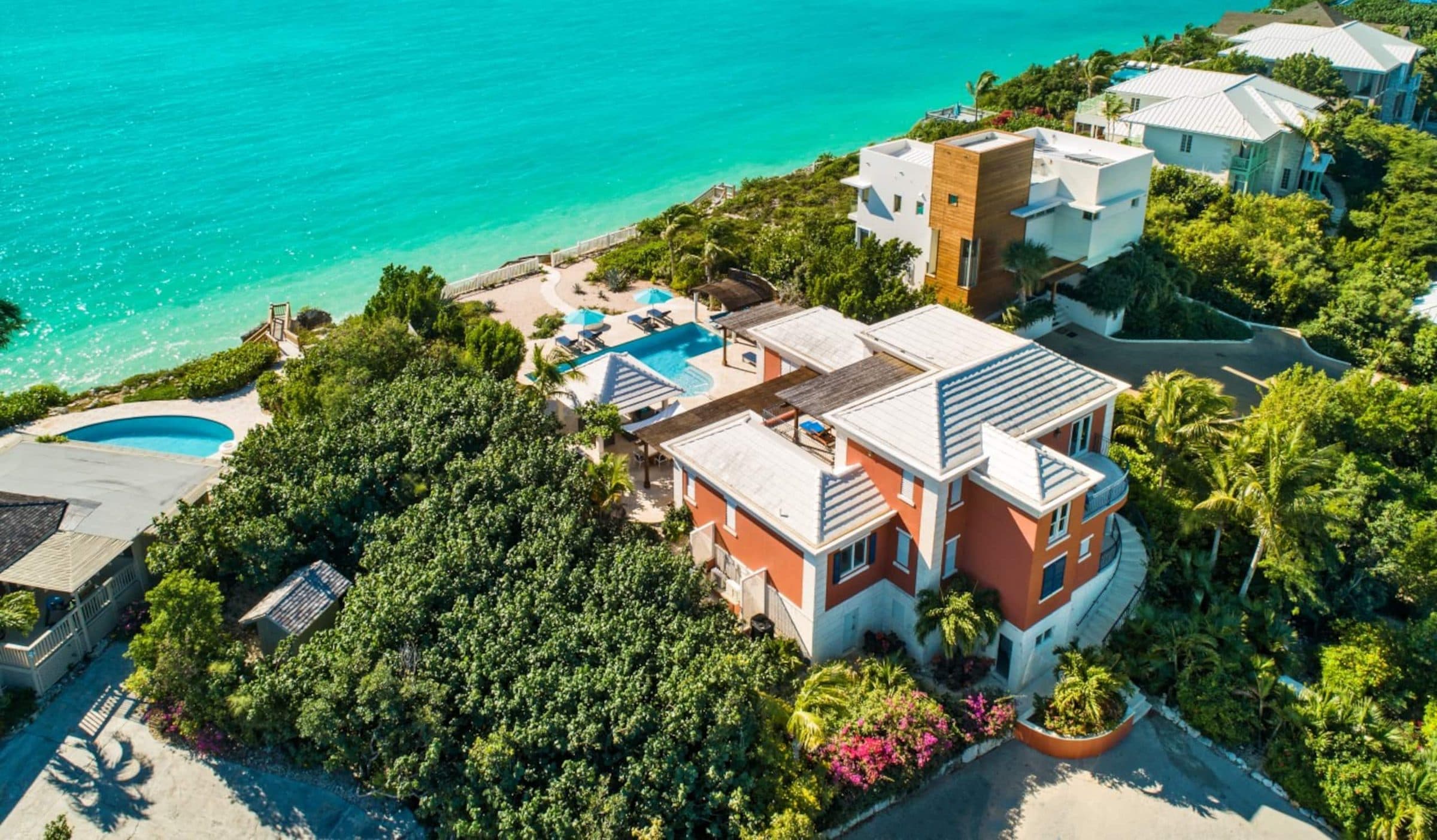 Aerial view of Villa La Percha near the ocean in Providenciales