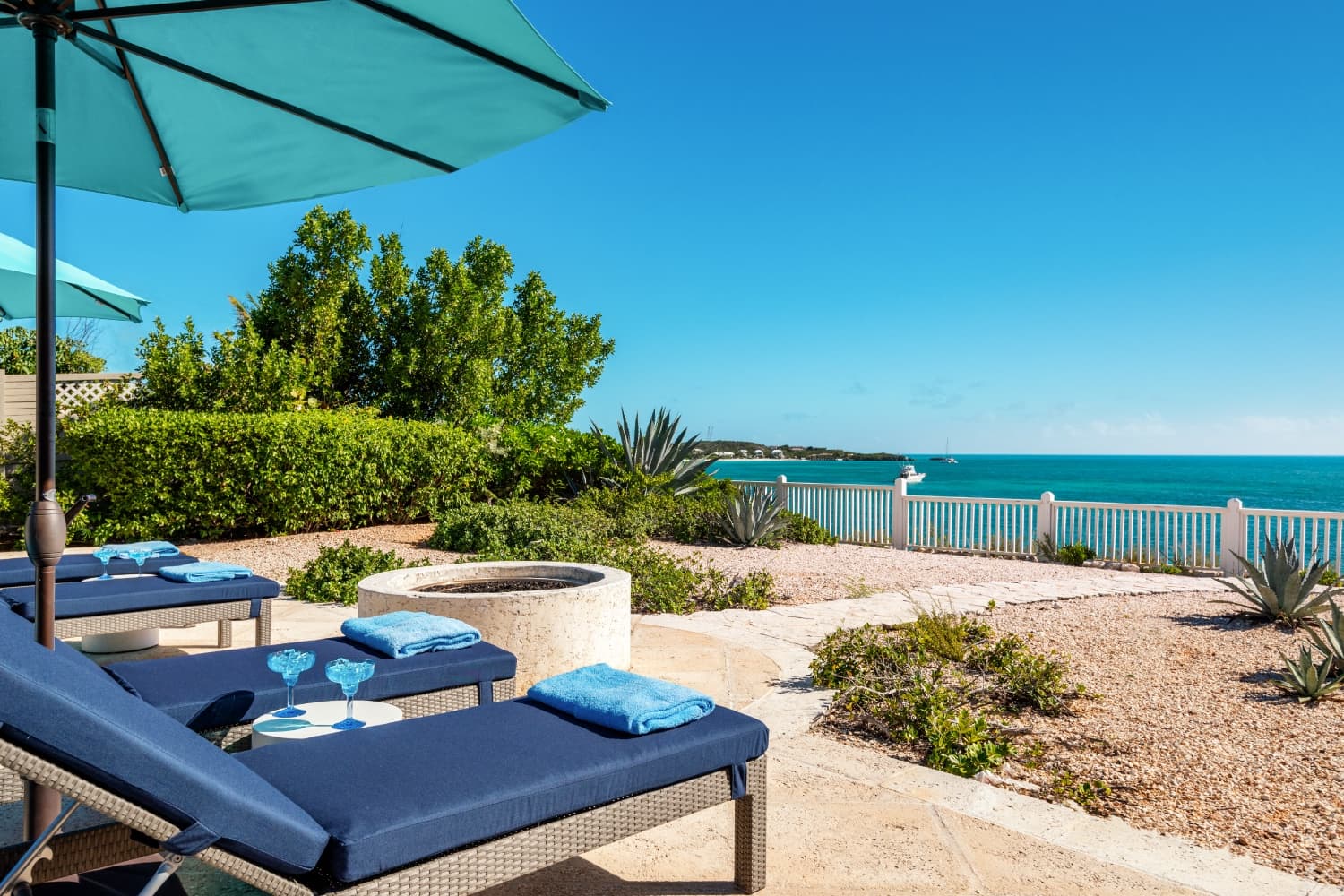 Lounge chairs and landscaping near Sapodilla Bay, Providenciales