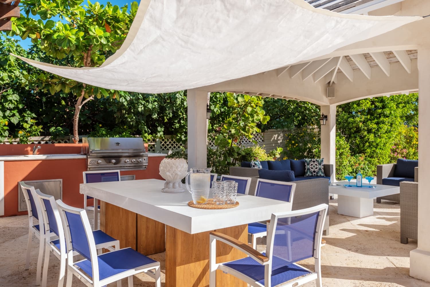 Outdoor kitchen and dining cabana at Villa La Percha