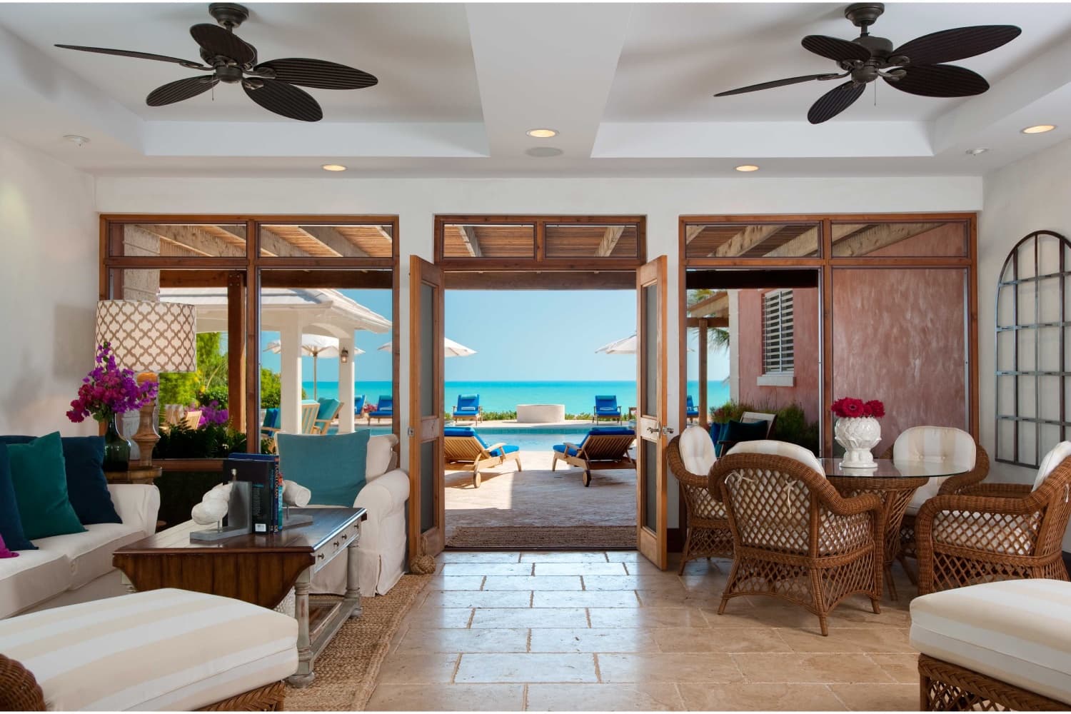 Villa La Percha screened living room opening toward the pool and ocean